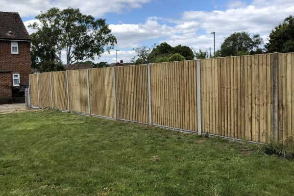 Brown wooden close board wooden fence